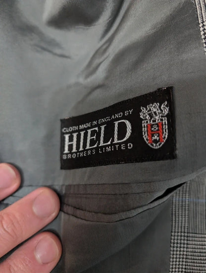 Eleganter grauer Prince-of-Wales-Anzug