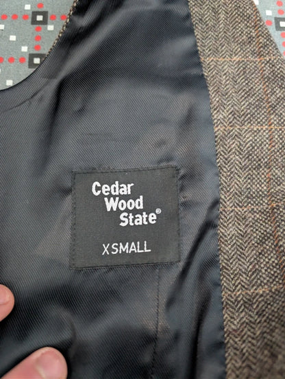 Graubraune Tweedweste