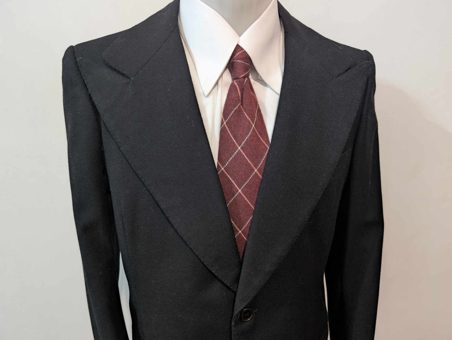 Sombre veste noire bespoke