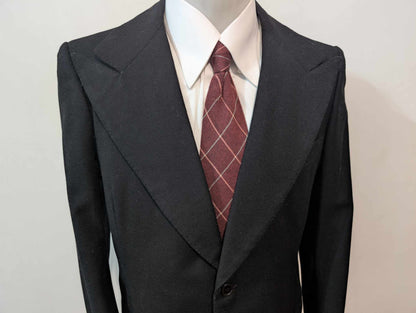 Sombre veste noire bespoke