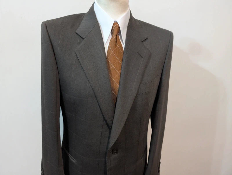 Elegante grüne karierte Wolljacke