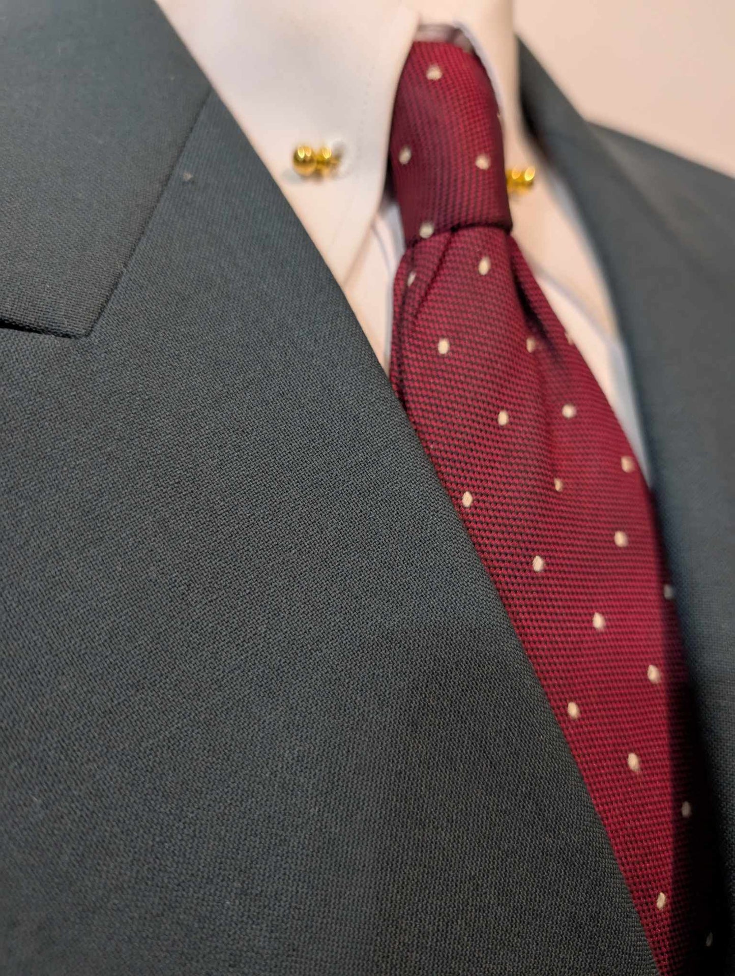 Original costume croisé de couleurs bleu vert en laine froide