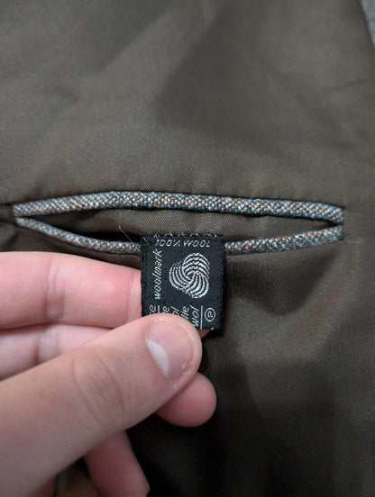 Légendaire costume gris en tweed