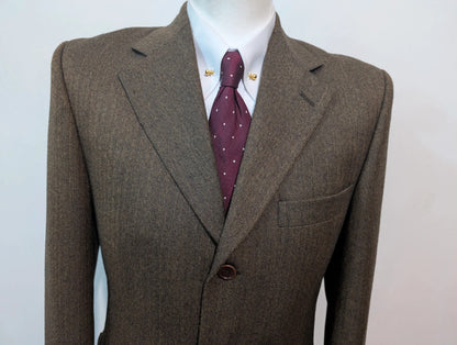Formidable veste marron à chevron en tweed