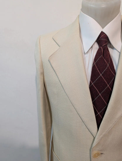 Merveilleux costume crème en laine