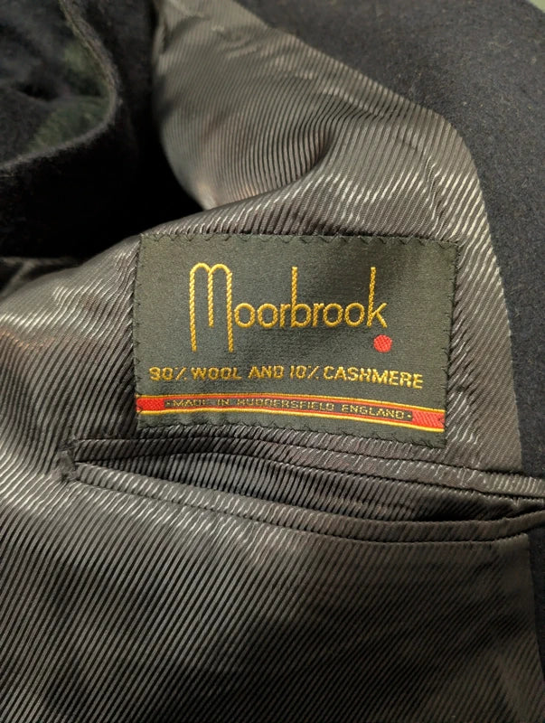 Legendärer marineblauer Zweireihermantel aus Wolle