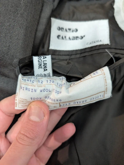 Elegante grüne karierte Wolljacke