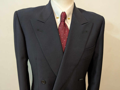 Élégant costume croisé bleu marine en laine