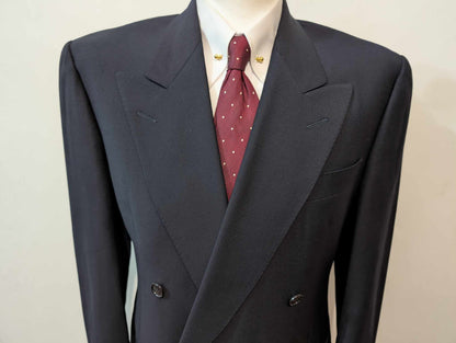 Redoutable costume croisé bleu marine en laine