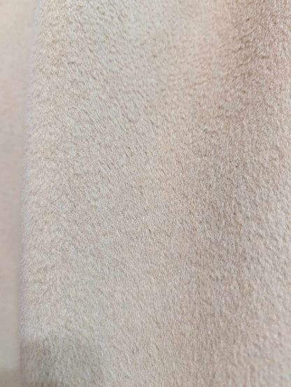 Lumineux manteau de couleur camel en laine et cachemire