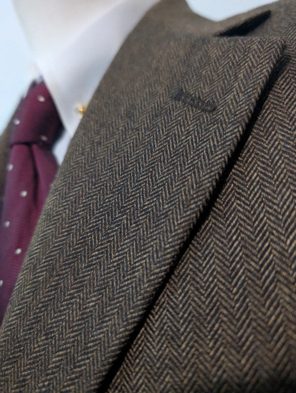 Formidable veste marron à chevron en tweed
