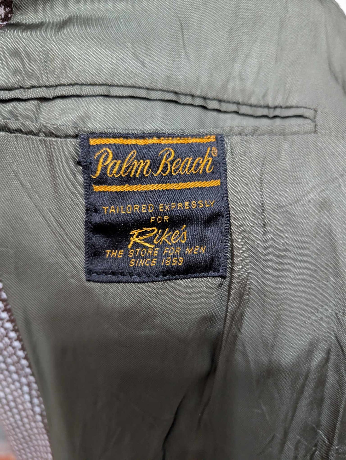 Excellente veste à motif pied de poule en laine