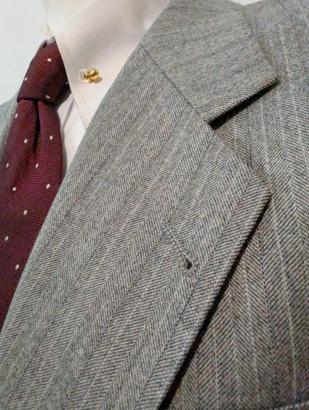 Légendaire costume gris en flanelle de laine