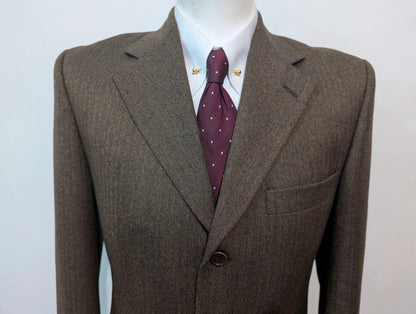 Formidable veste marron à chevron en tweed