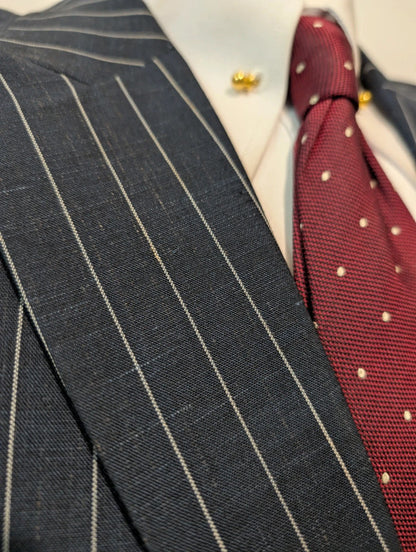 Exceptional pinstripe suit in cold wool